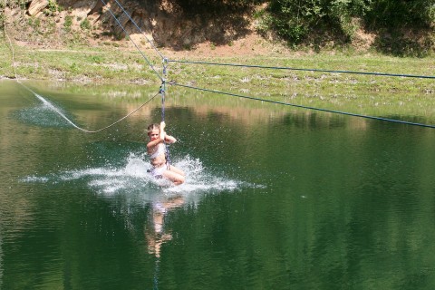 With the zip-line across the lake in Kaitanger